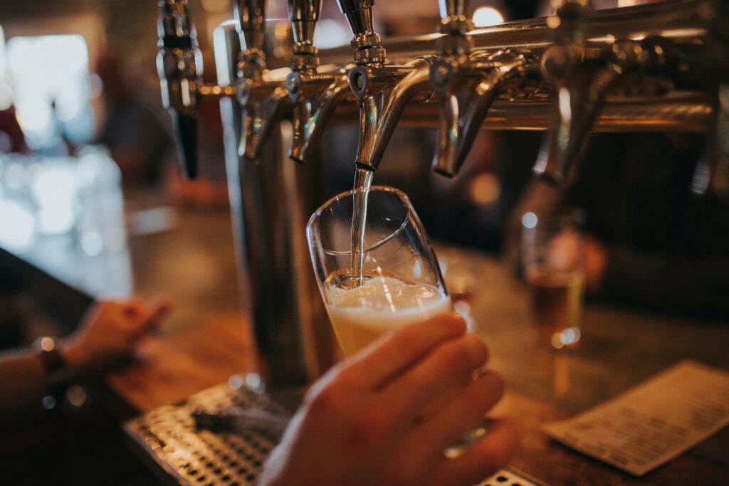 Lager being poured from beer pump
