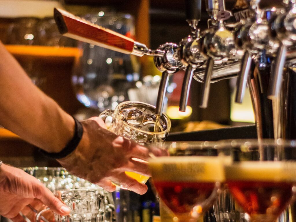 Pint being poured in bar