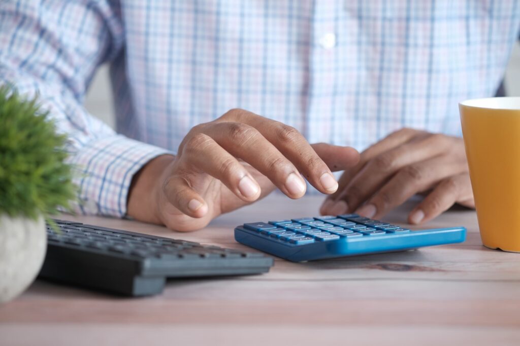 Accountant using calculator